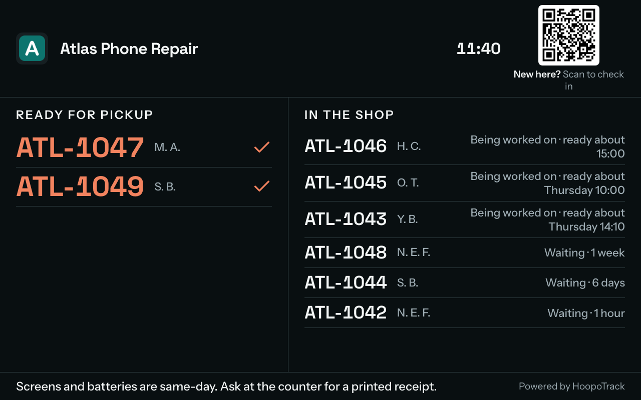The waiting-room board in TV mode: "Ready for pickup" beside "In the shop", with ticket numbers and initials on both, the clock, the check-in QR code with "New here? Scan to check in", and your announcement along the bottom.